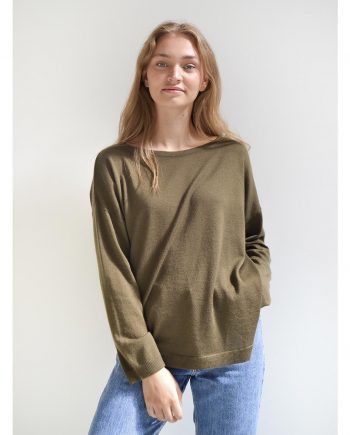 Our model in Julie Pullover in a beautiful olive green color. Oversize sweater with boat neckline.