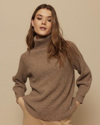Oversize, ribbed turtleneck sweater in 100% premium heavy cashmere knit from Inner Mongolia with high, folded neckline, raglan sleeves, and rib knitted at neck, cuffs and hem.